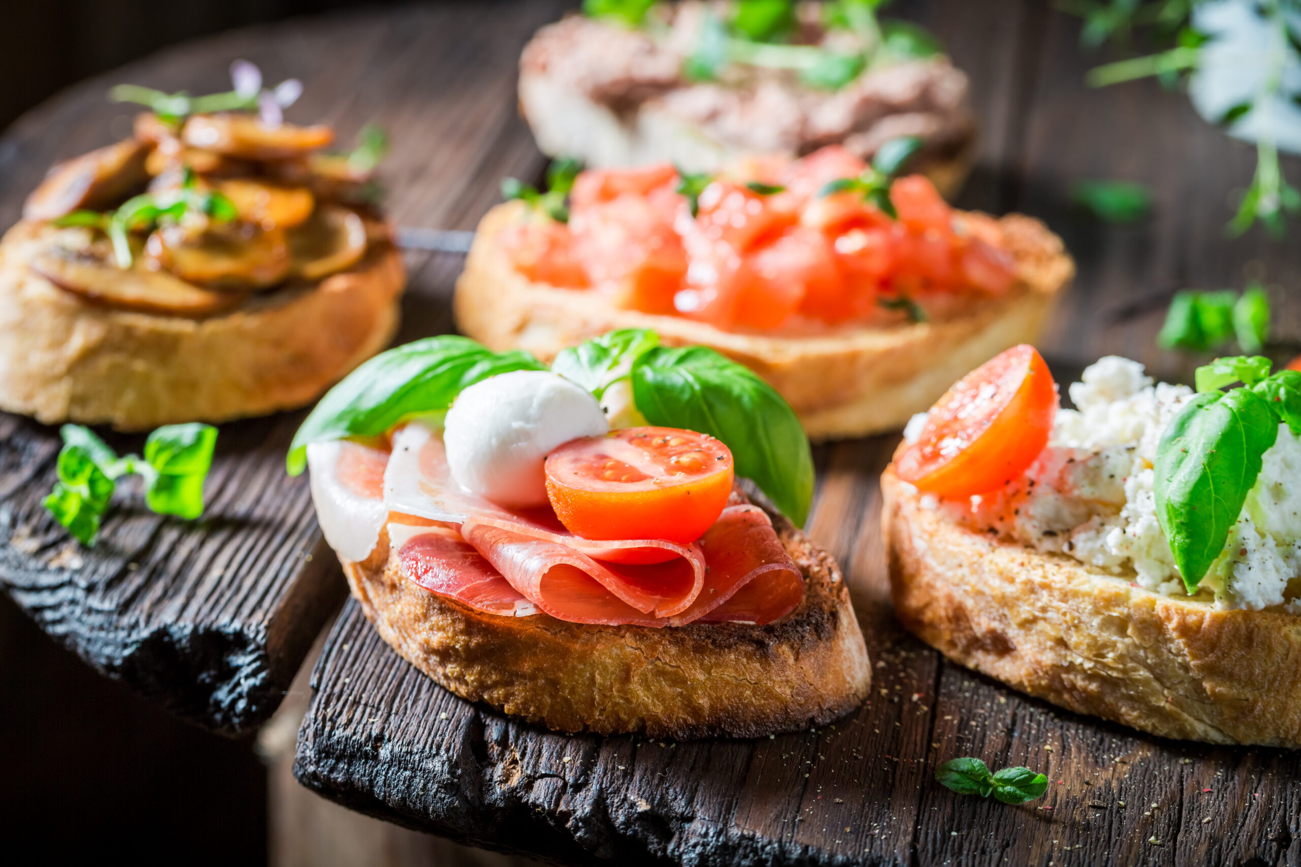 Closeup of crisp mix of bruschetta with fresh ingredients